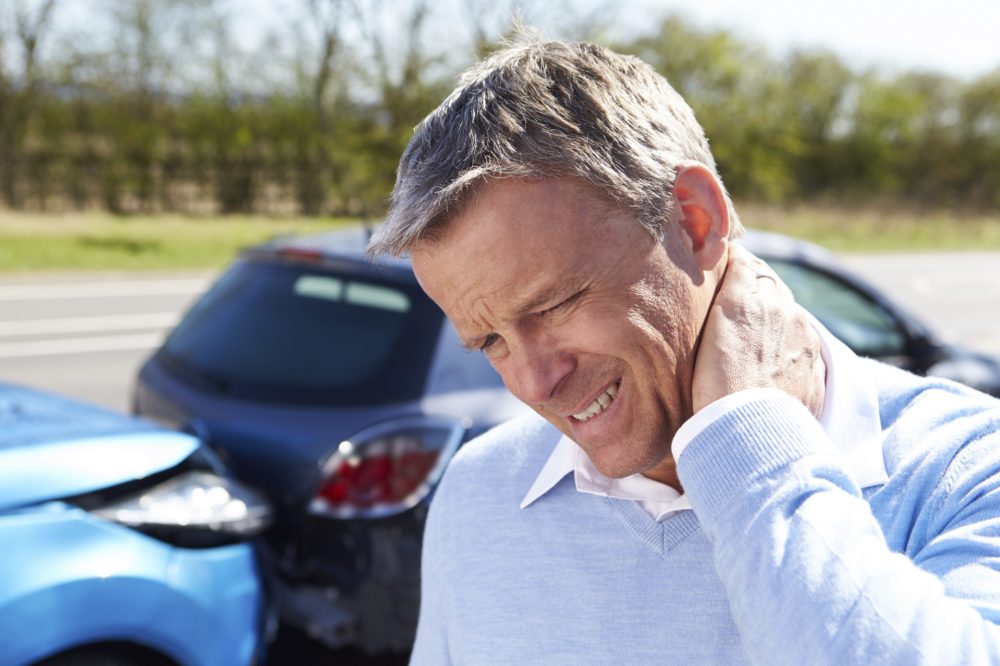 Driver Suffering From Whiplash After Traffic Collision - Synergy Chiropractic of Houston